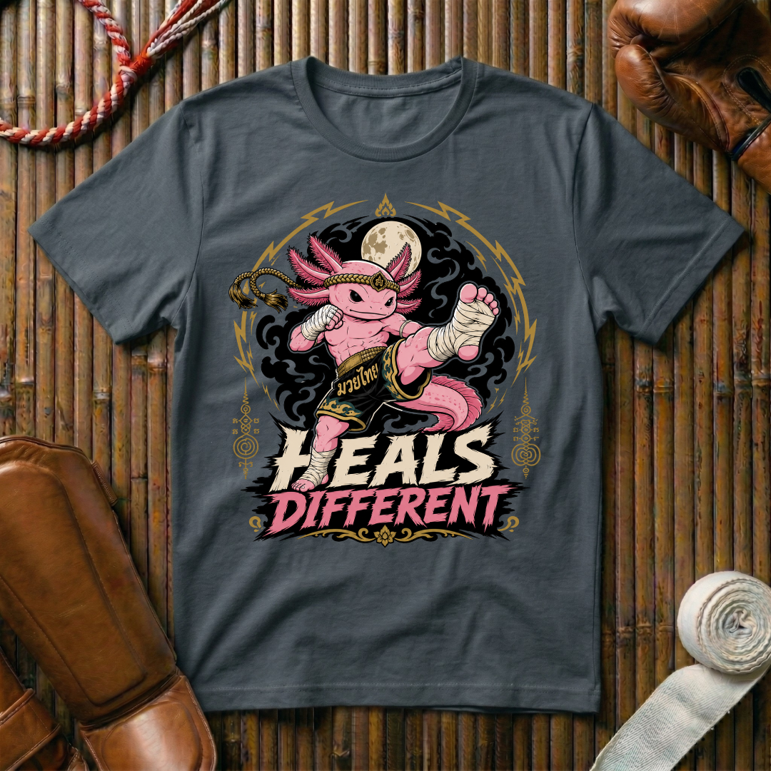 Heals Different - T‑Shirt