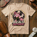 Heals Different - T‑Shirt