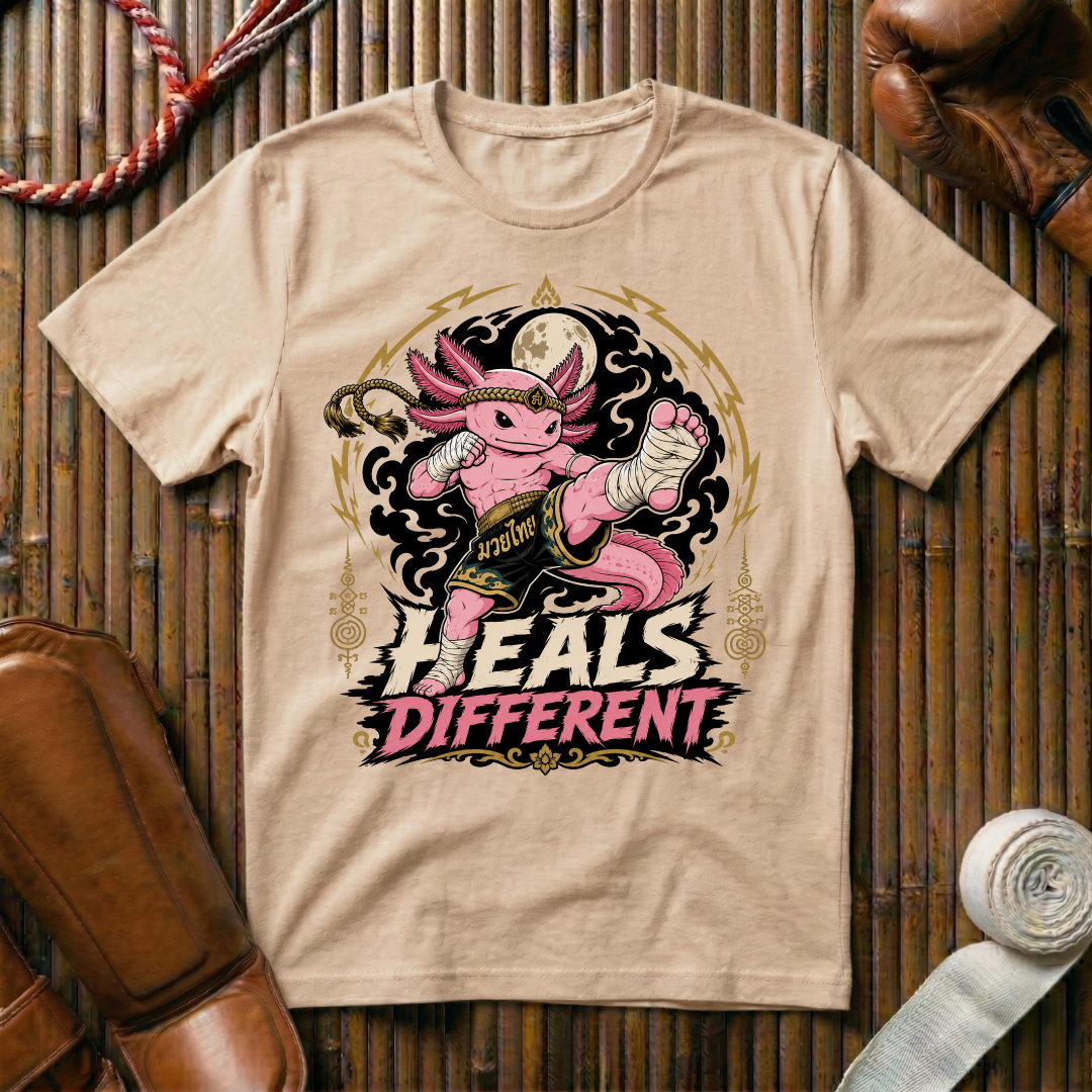 Heals Different - T‑Shirt