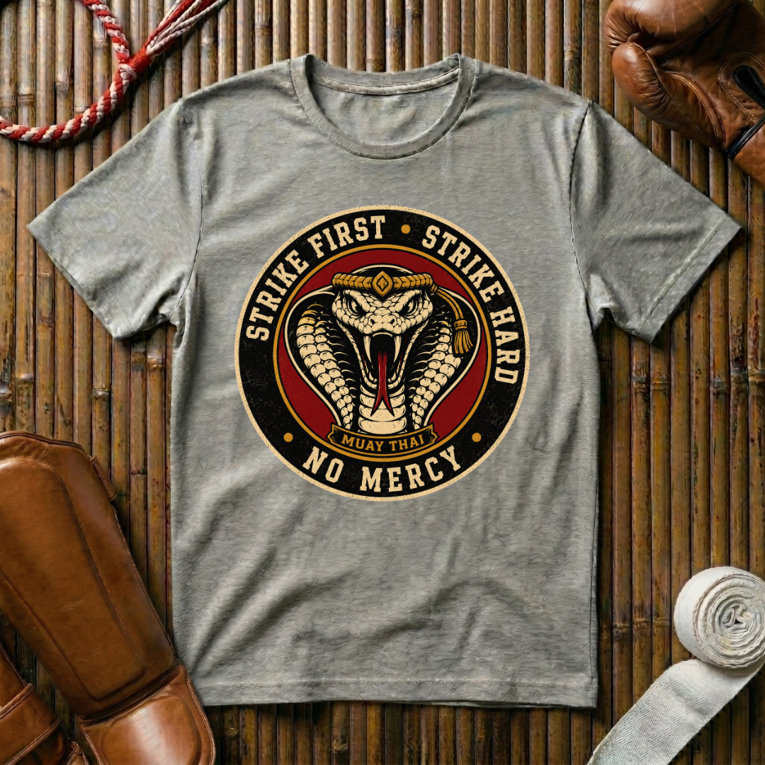 Strike First - T‑Shirt