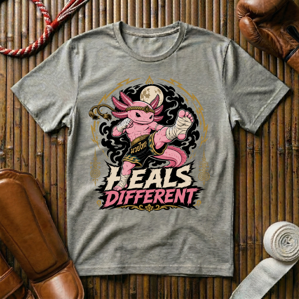 Heals Different - T‑Shirt