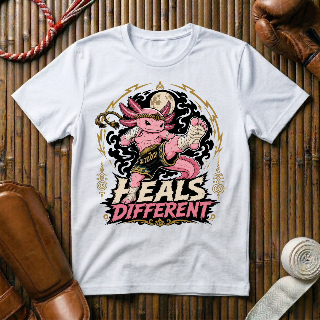 Heals Different - T‑Shirt